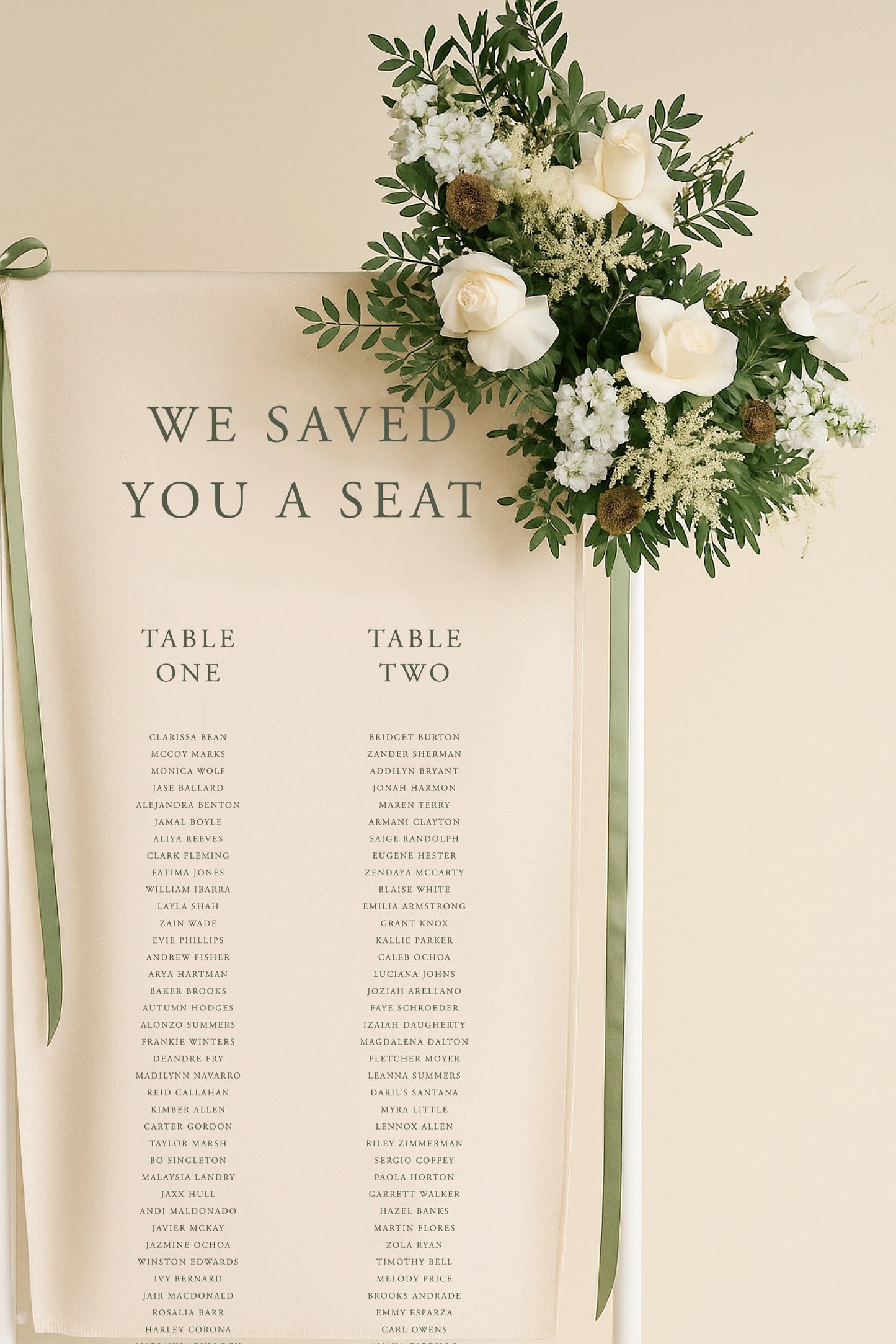 Wedding seating chart with floral decoration on a beige background