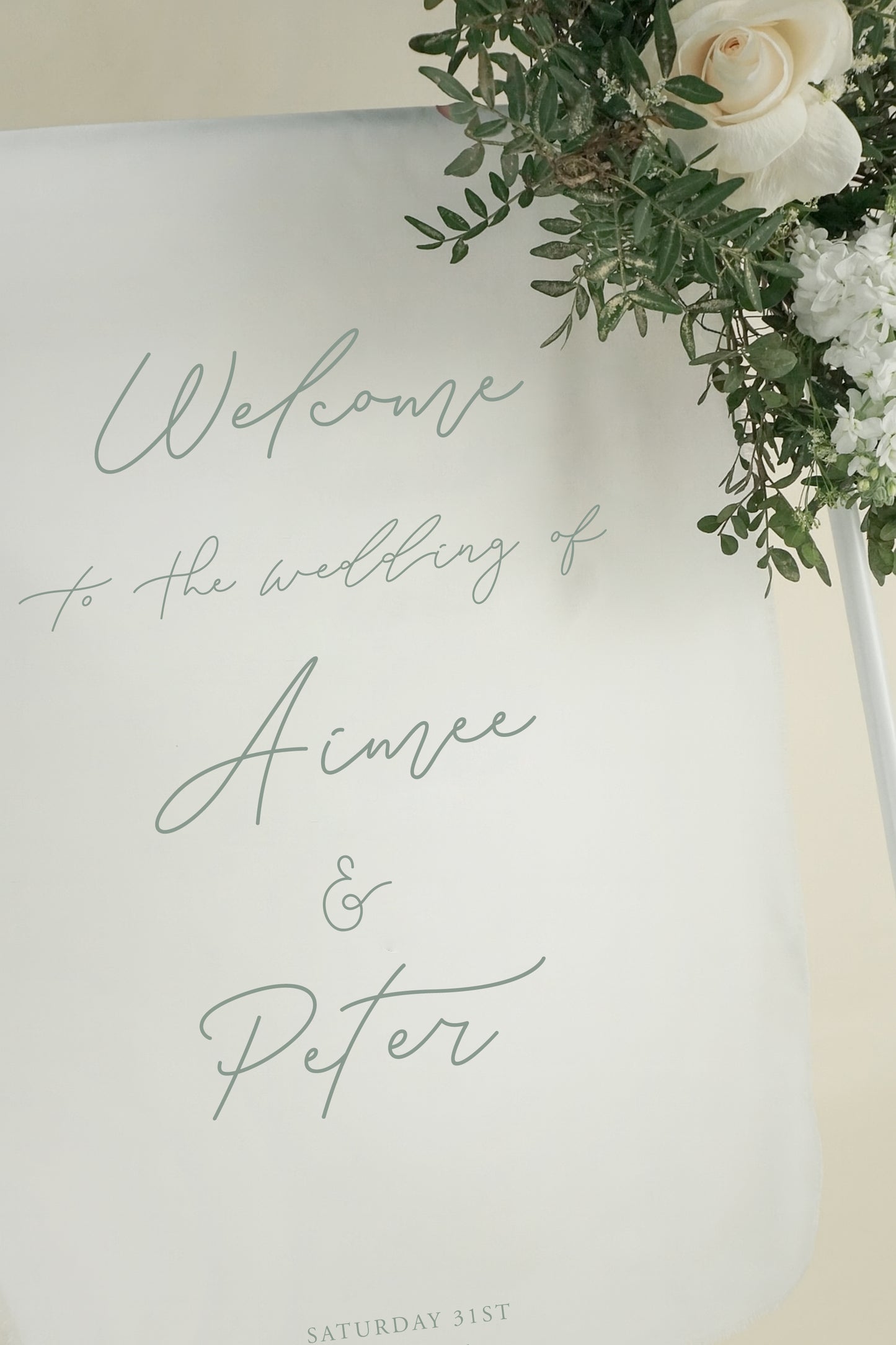 Wedding welcome sign with floral decoration on a white background