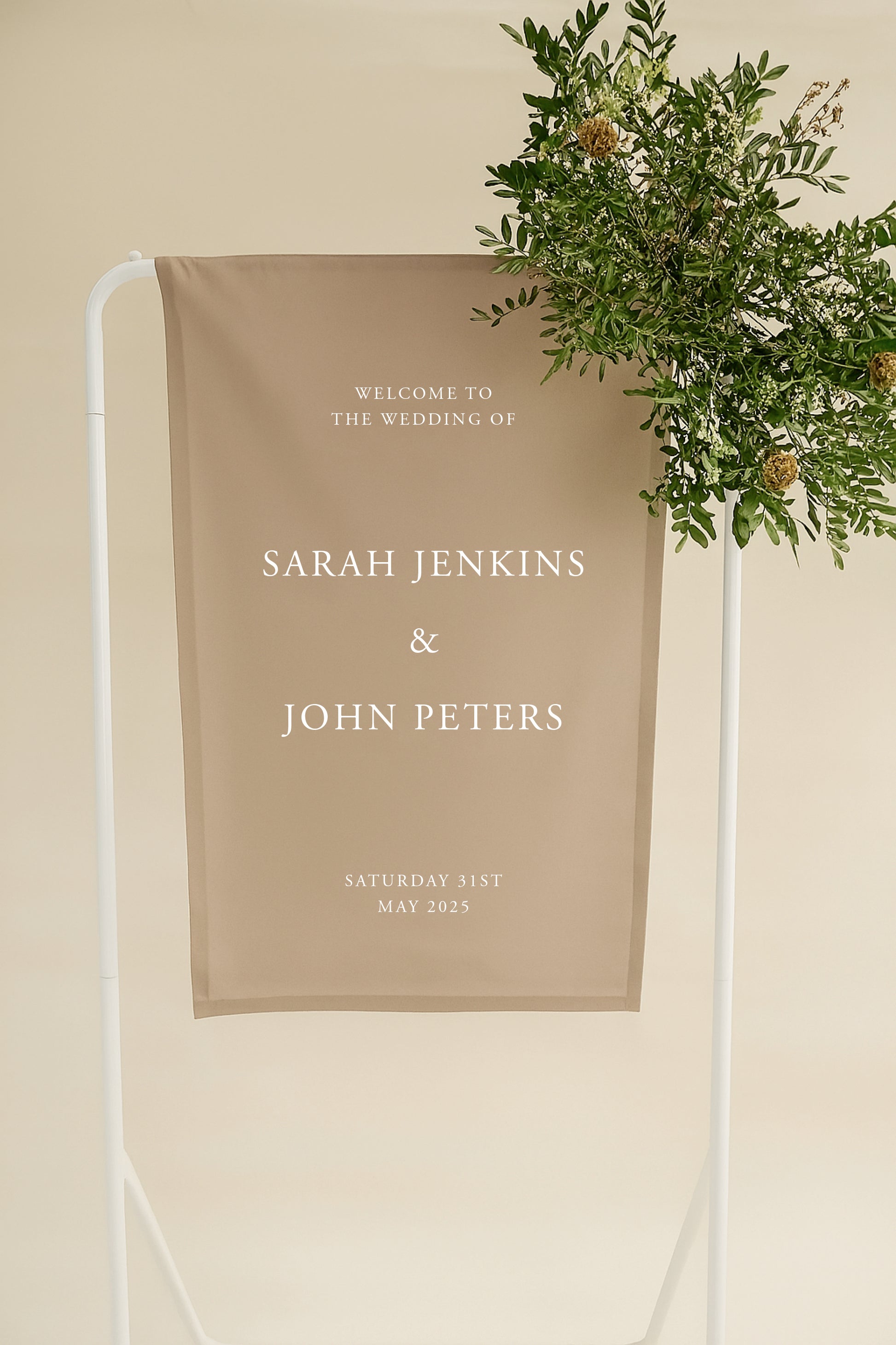 Wedding welcome sign with names and date on a beige background