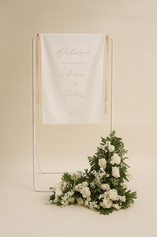 Decorative sign with floral arrangement on a beige background