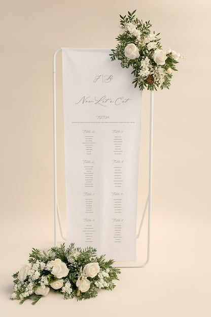 Seating chart with floral decorations on a beige background