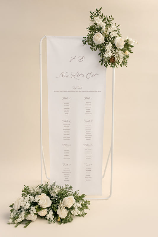 Seating chart with floral decorations on a beige background