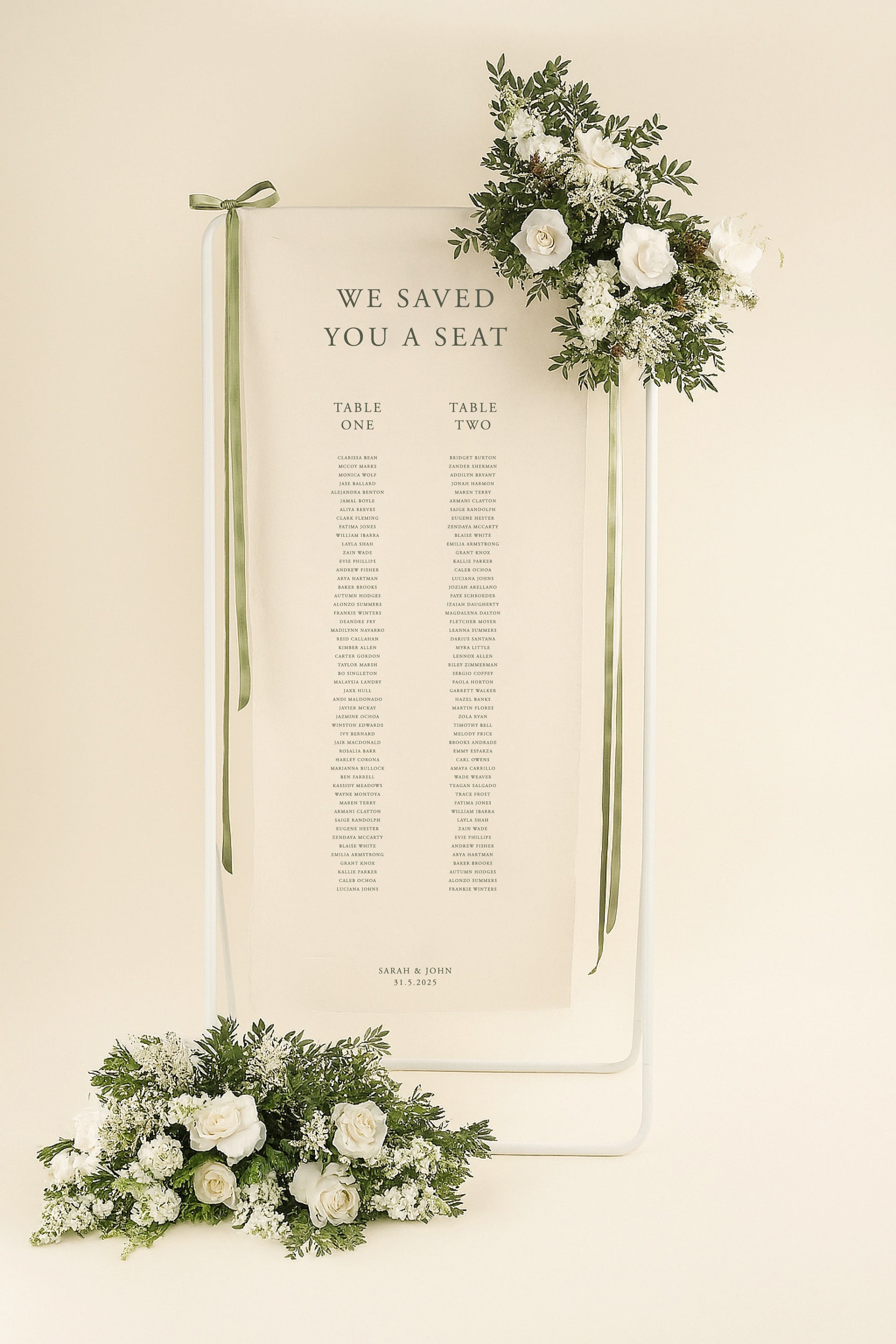 Wedding seating chart with floral decorations on a beige background